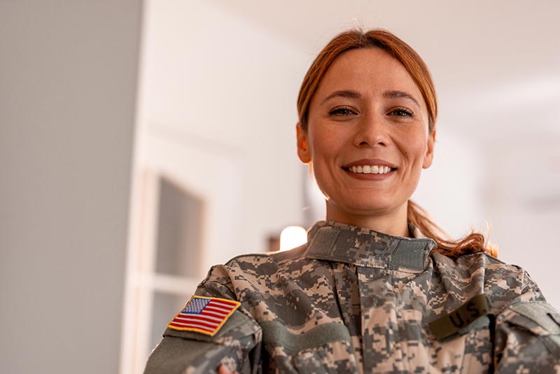 Image for contacting Brave Veteran, showing a smiling female soldier